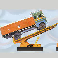 Hydraulic truck unloader